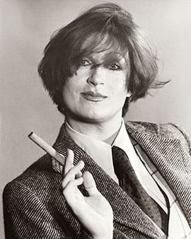 073_CAA_SU13 Studio portrait of Lynn Harris in male attire, 1977, Lynn Edward Harris Papers, ONE National Gay and Lesbian Archives at the USC Libraries (photograph provided by ONE Archives)