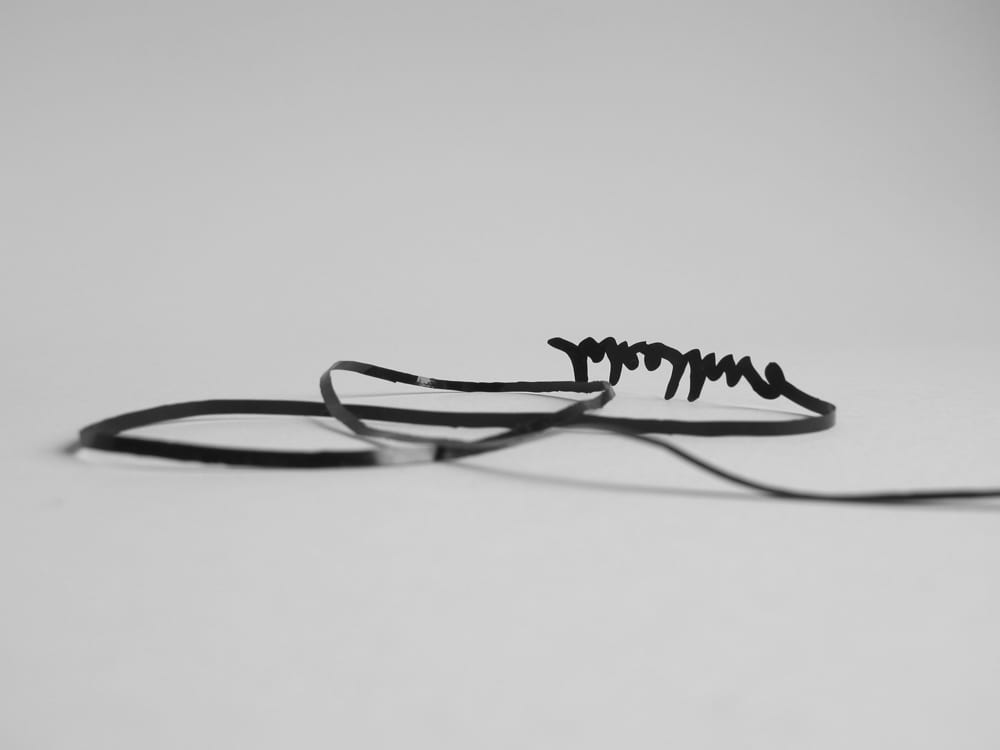 Tamarin Norwood, Line Describing a Curve iii, 2014, adhesive vinyl peeled from Line Describing a Curve (ii),  sequence of 14 b/w digital photographs (180mm x 120mm), (artwork © Tamarin Norwood)