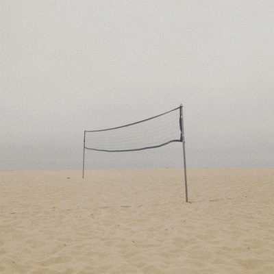 Empty volleyball court by the Long Island Sound, Connecticut (photograph © Matthew Israel)