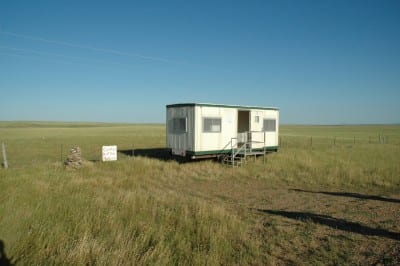 Center for Land Use Interpretation and the Institute for Marking and Measuring, Centers of the USA, 2013, field west of Twin Tops Mountain, South Dakota (photograph by CLUI published under a Creative Commons A-NC-SA license, creativecommons.org/licenses/by-nc-sa/3.0/us/legalcode) The site is calculated to be the present geographic center of the United States. Other centers marked in the project include a spot in Kansas that is the center of the forty-eight contiguous states, the town of Plato, Missouri, that is the population center of the United States, a lake in North Dakota that is calculated to be the geographic center of North America, and a field in Wisconsin that lies at the intersection of 45° North and 90° West and is thus the center of the northwest quadrant of the globe. http://clui.org/page/center-continguous-united-states