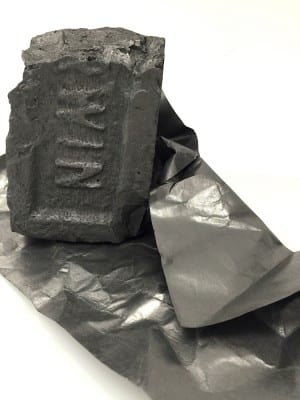 Diana Shpungin, Paper Weight (Win), 2015, graphite pencil, brick, drawing paper, 9 x 12 x 8 in. (22.8 x 30.4 x 20.3 cm) (artwork © Diana Shpungin) 