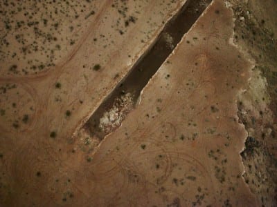 Aerial partial view of Michael Heizer, Double Negative, 1969–70,  production still from Troublemakers, 2014 (photograph © Summitridge Pictures and RSJC LLC)