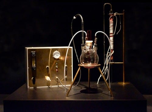 Adam Brown, The Great Work of the Metal Lover, 2012, glass alchemical bioreactor, gas manifold and gas tank filled with hydrogen and carbon dioxide, made in collaboration with Kazem Kashefi (artwork © Adam Brown; photograph provided by Beall Center for Art + Technology, University of California, Irvine). View of the alchemical installation.