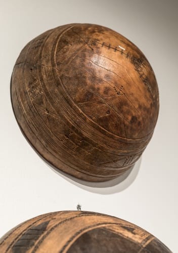 Unidentified artist, installation view and detail of a Tuareg bowl, ca. 1960s–70s in Made to Move: African Nomadic Design, Handwerker Gallery, 2017. Collection of Herbert F. Johnson Museum of Art (photograph by Risham Majeed)