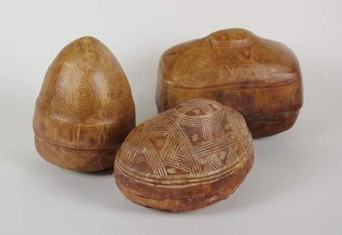 Unidentified artists, Tuareg (Mali, Niger), three leather boxes, ca. 1970s, leather and pigment, installation view, Made to Move: African Nomadic Design Handwerker Gallery, 2017. Collection of Herbert F. Johnson Museum of Art (photograph by Randi Millman-Brown)