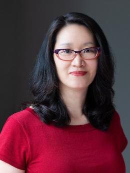 Color photograph of Bonnie Cheng, smiling and looking toward the camera