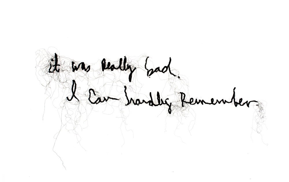 Artwork consisting of black thread that is twisted to spell the phrase "it was really bad. O can hardly remember," in cursive