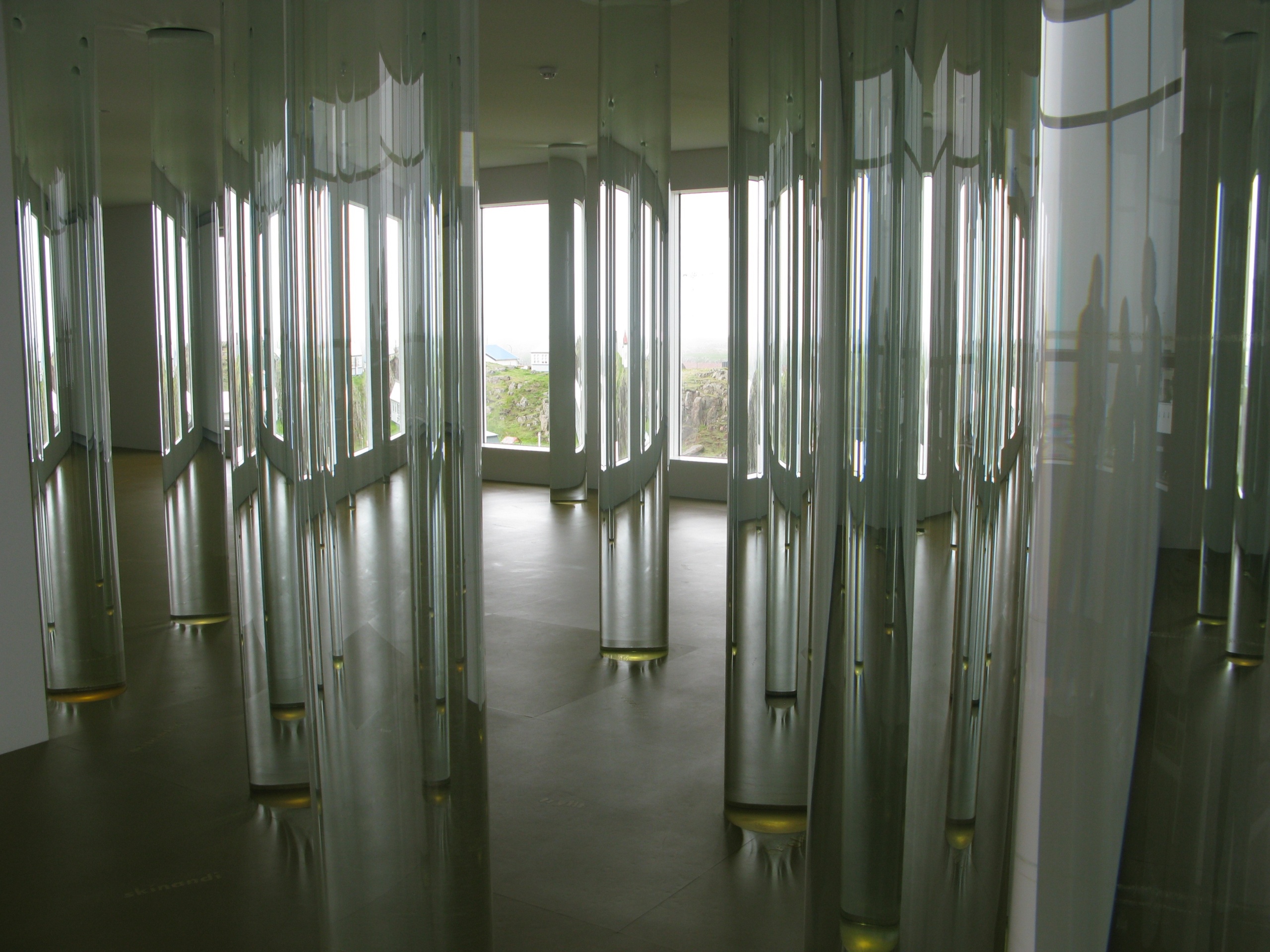 Floor-to-ceiling glass columns containing melt ice removed from Icelandic glaciers, from Vatnasafn/Library of Water located in Stykkisholmur, Iceland, 2007