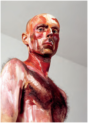 Upper body of the artist, overpainted in dramatic colors, reminiscent of exposed flesh, particularly in the neck area. The gaze of the figure in the painting is turned towards us. In the background: white ceiling and wall.