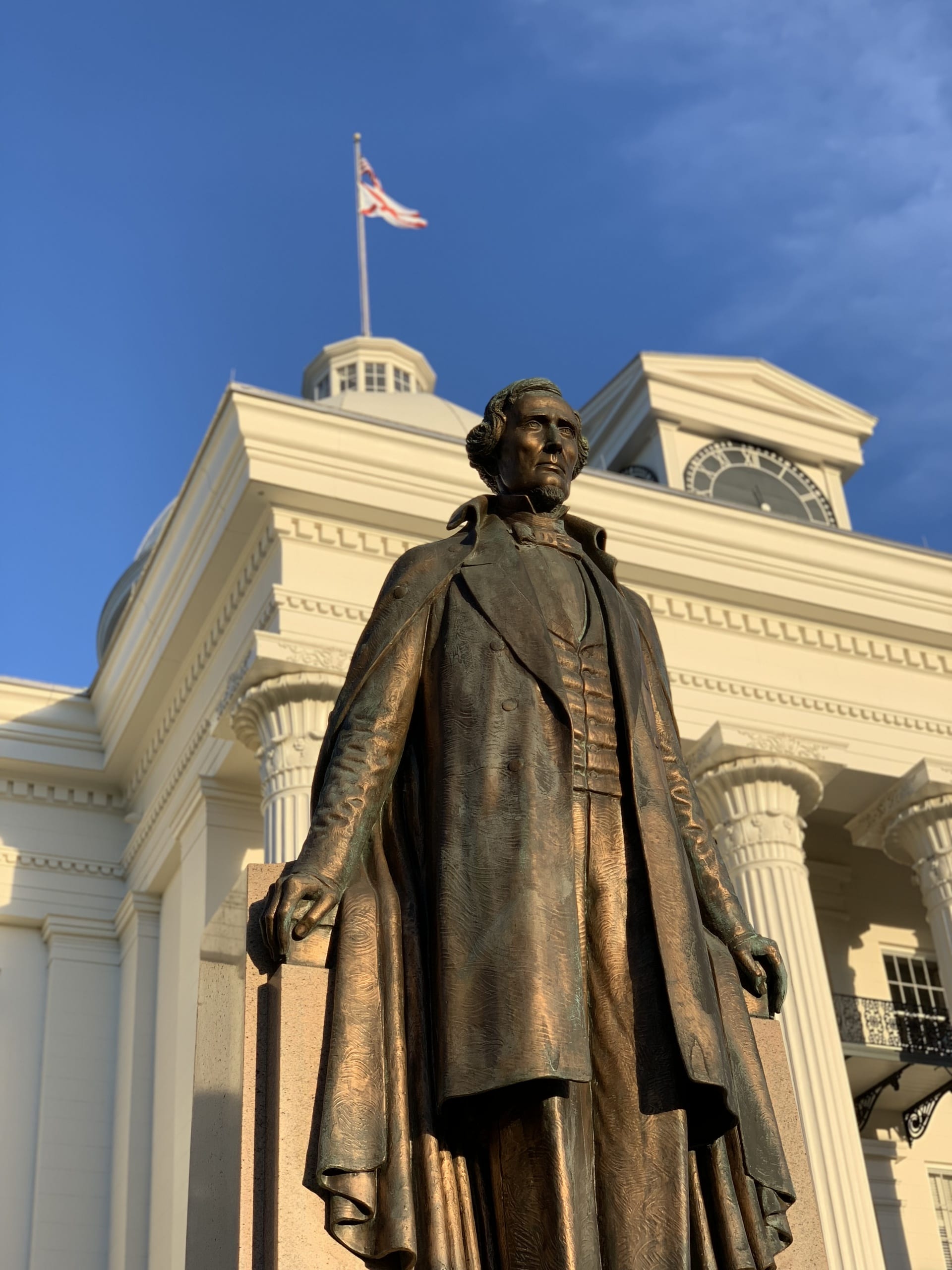 over life size bronze sculpture of Jefferson Davis with arms outstretched