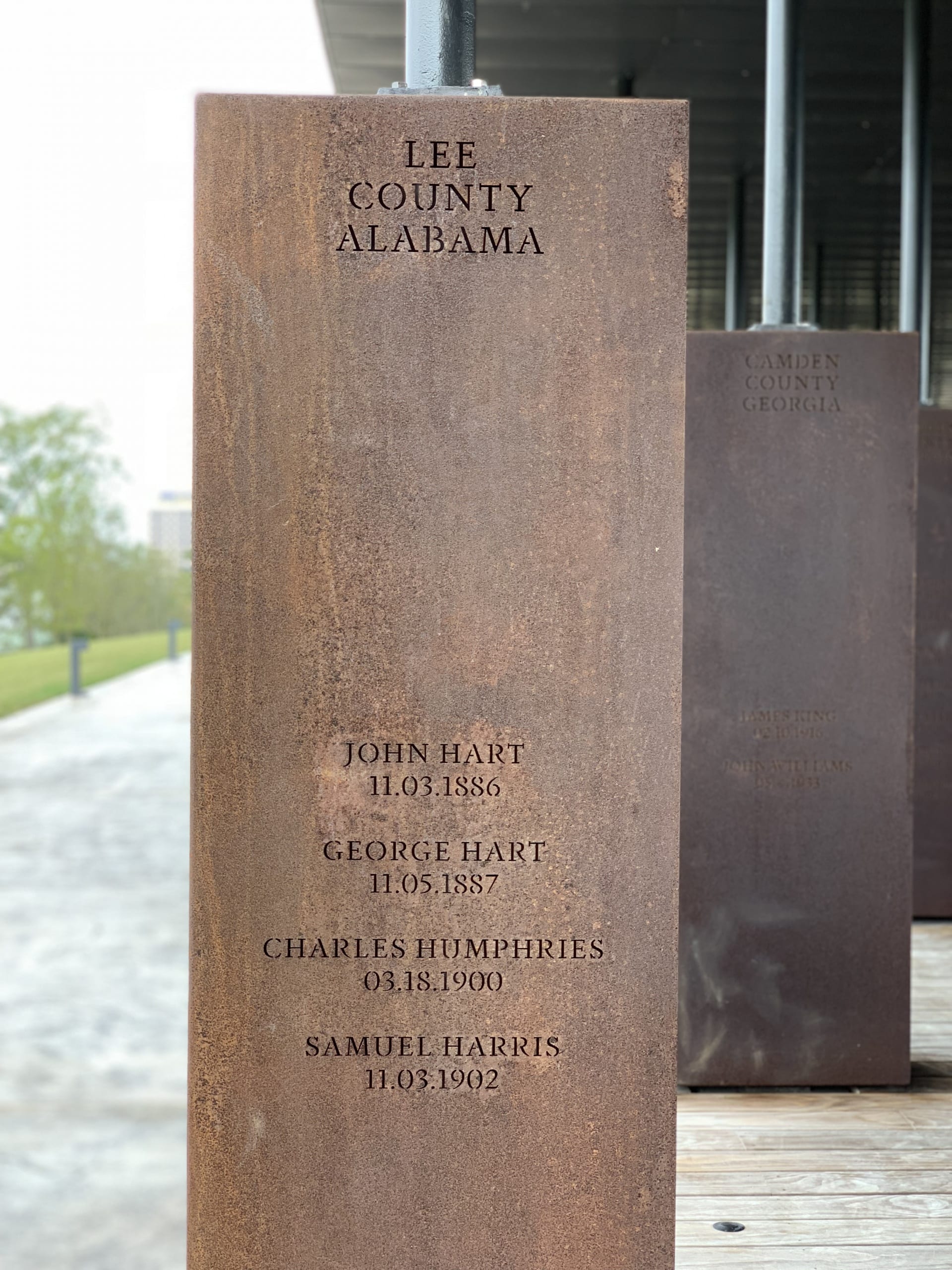 detail of a memorial stele "Lee County Alabama" with names of 4 lynching victims