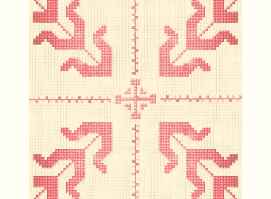 Color image of a traditional red Moldovan embroidery pattern drawn on graph paper.